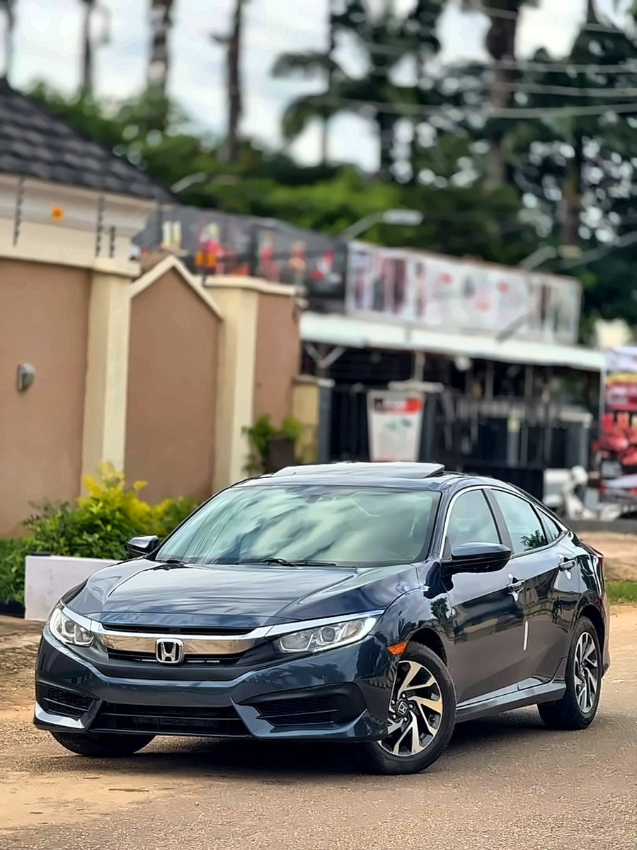 2016 Honda Civic EX in deep blue, front three-quarter view